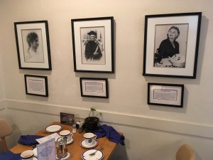 Photos of groundbreaking female faculty hang on the walls